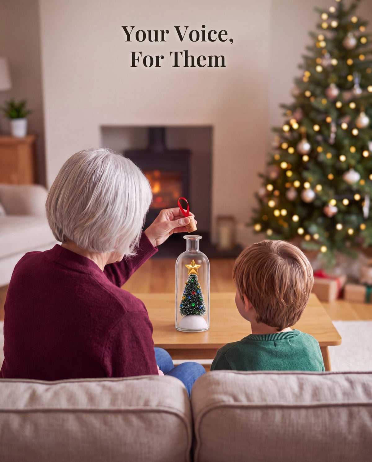 A grandmother, seen from behind, lifting the cork on the coffee table while a small boy watches, by a fireplace and a lit tree.