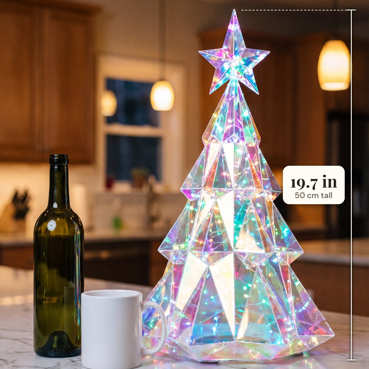 The 19.7-inch tree beside a standard wine bottle and a mug